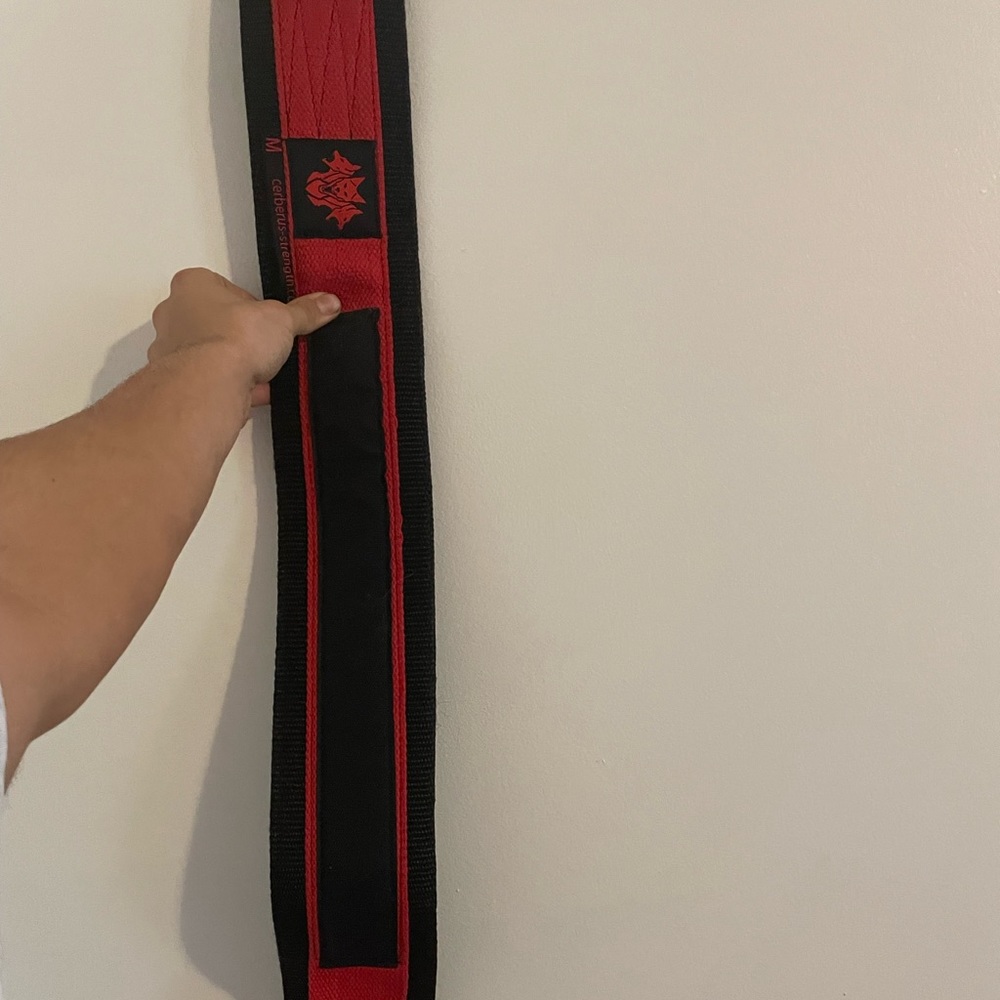 Got it for Christmas, don’t need it. Fits a medium or small man. Strap lifting